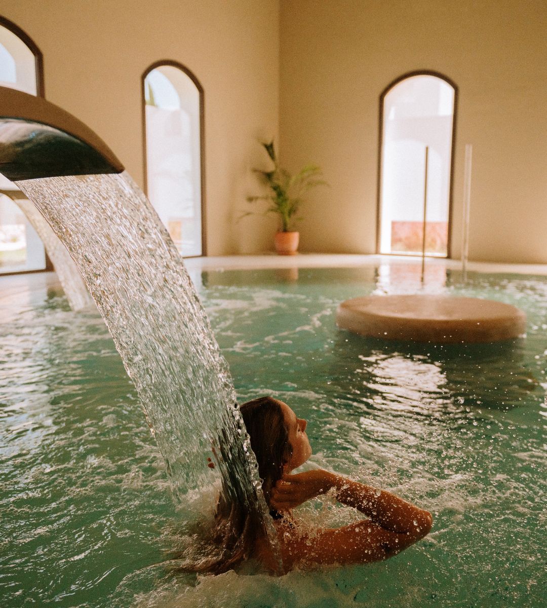 Woman in water circuit at Mood Spa